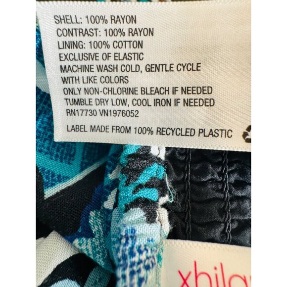 2/$25 NWOT Xhilaration M  Floral Low Cut Jumpsuit Blue Black Teal White - Picture 10 of 14